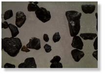 Grains of basalt, palagonite and rhyolite.